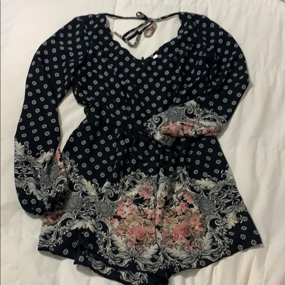 Black long sleeve shorts romper.